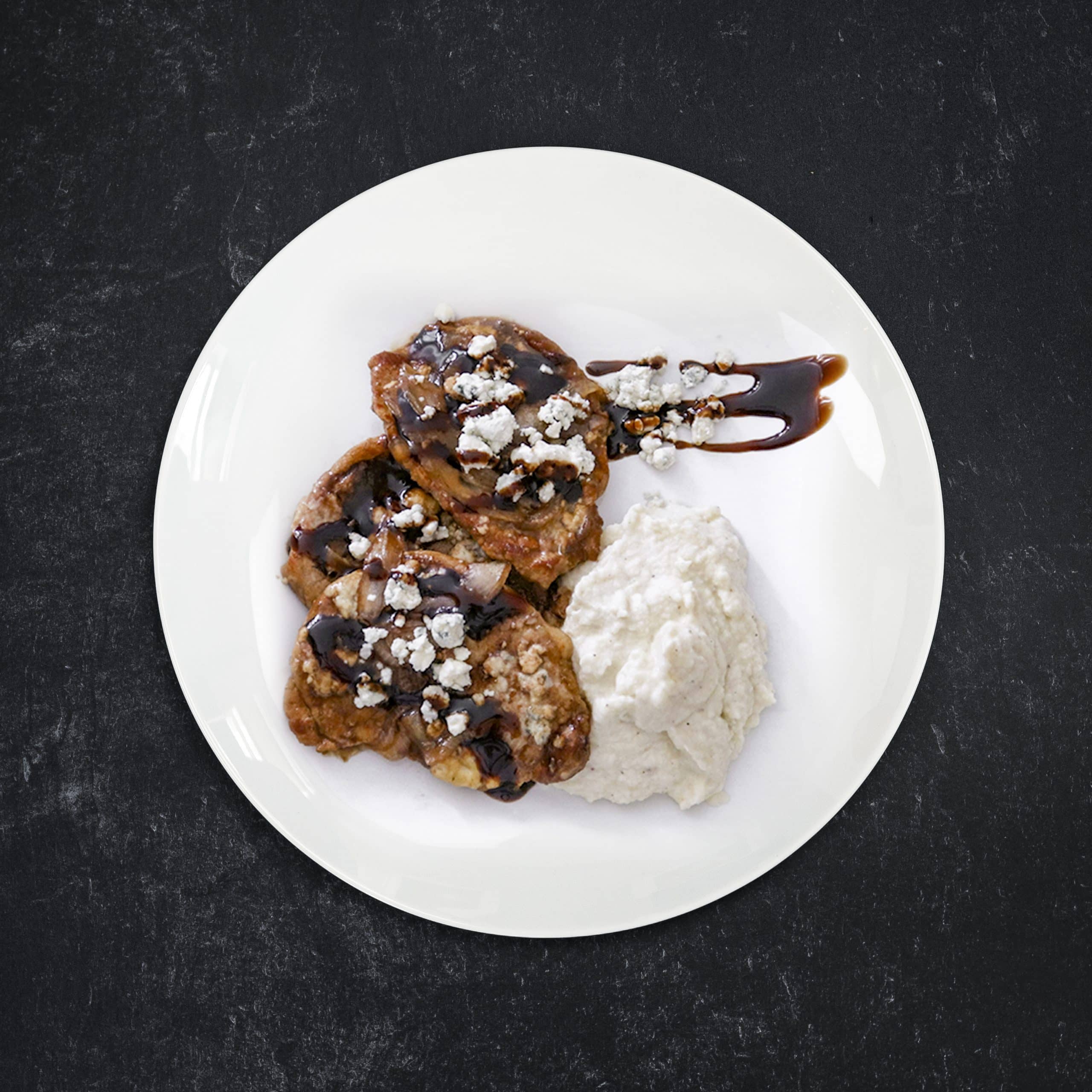 Seared Pork with Caramelized Onion, Balsamic Glaze and Blue Cheese