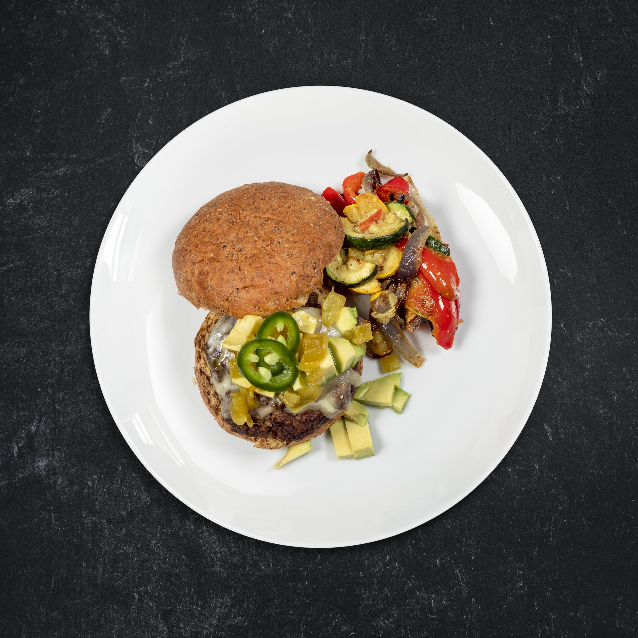 Southwestern Stuffed Grass-Fed Burger on Sprouted Grain