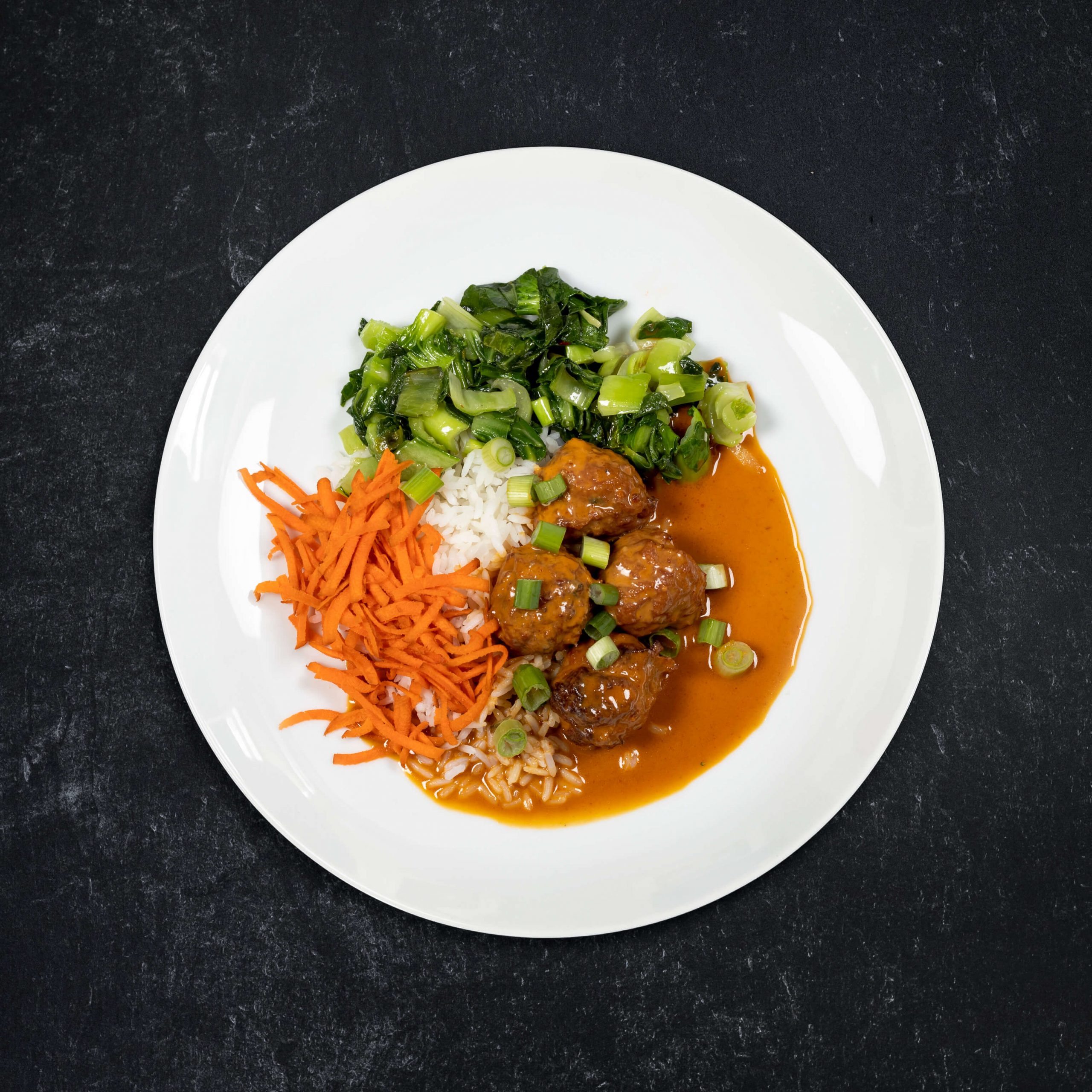Thai Coconut Curry Turkey Meatballs over Cauliflower Rice