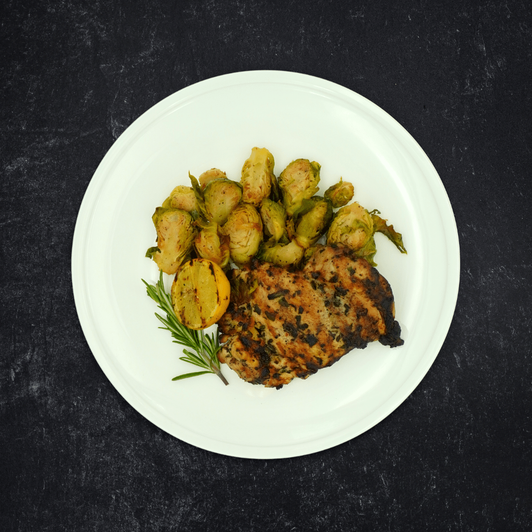 Herb Roasted Free-Range Chicken Thighs with Charred Balsamic Brussels Sprouts